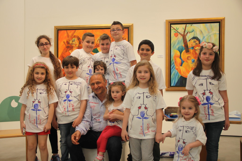 Yuroz with children drawing on t shirts
